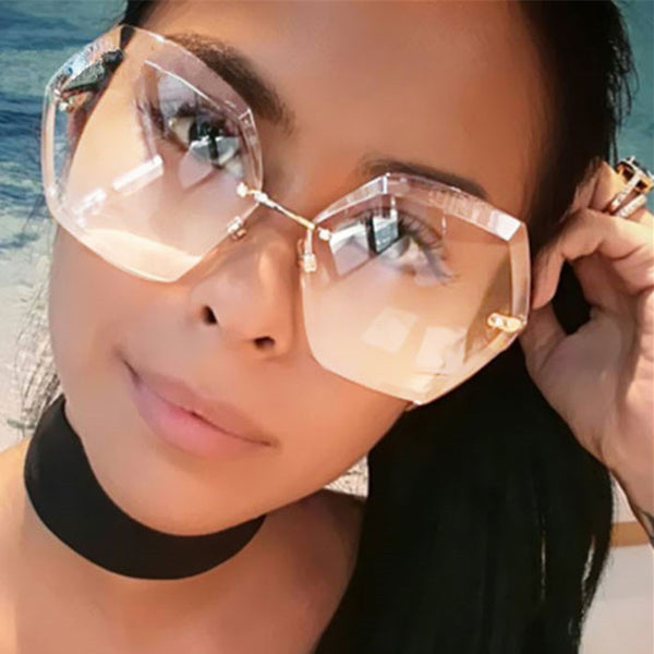 Designer Rimless Sunglasses.